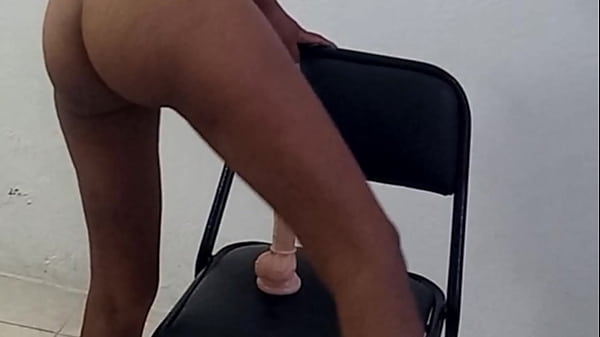 Beautiful Indian woman with natural tits masturbates on a chair and moans like a bitch